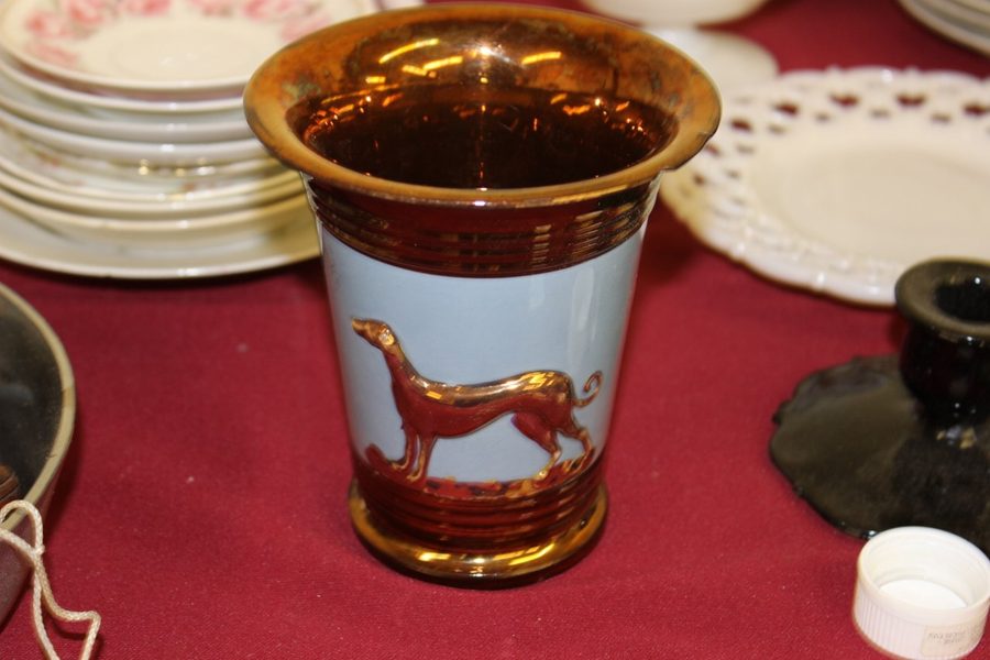 Antique copper luster vase with greyhound sold at Pennsylvania auction